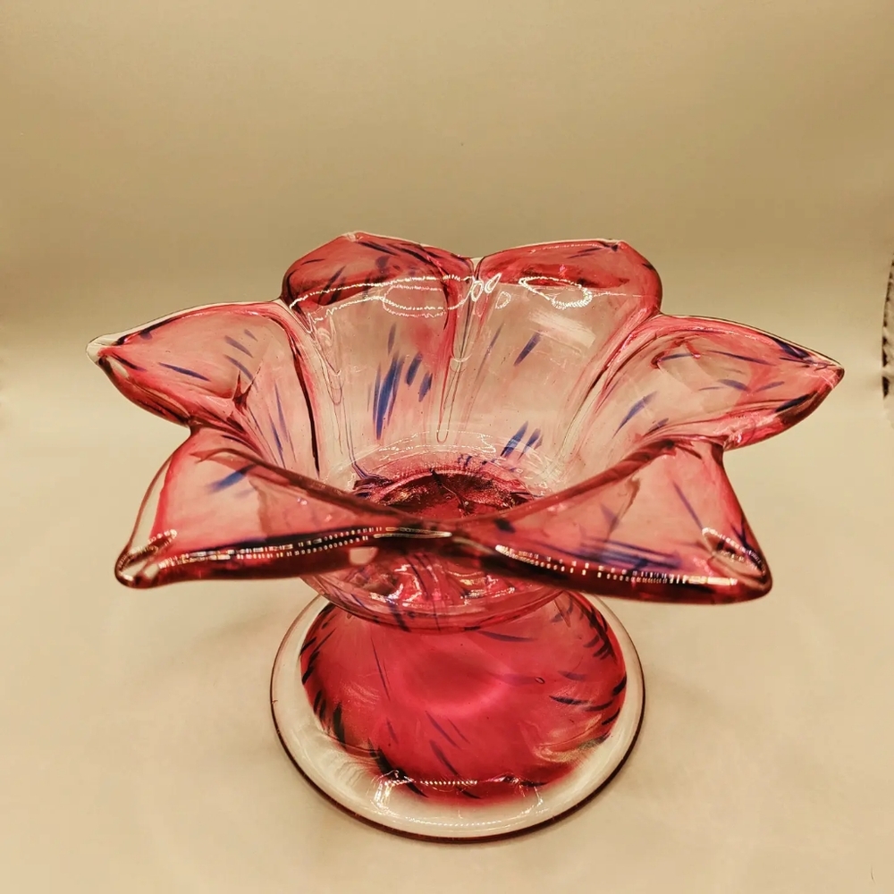 Hand blown pink, blue, and clear flower pedestal dish.